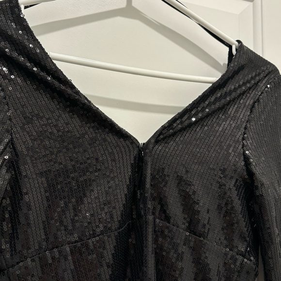 Black sequence mini dress with 3/4 length sleeves. - Picture 2 of 2